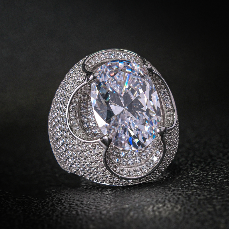 Kiss The Ring Of A Moissanite Oval Spessartine Ring