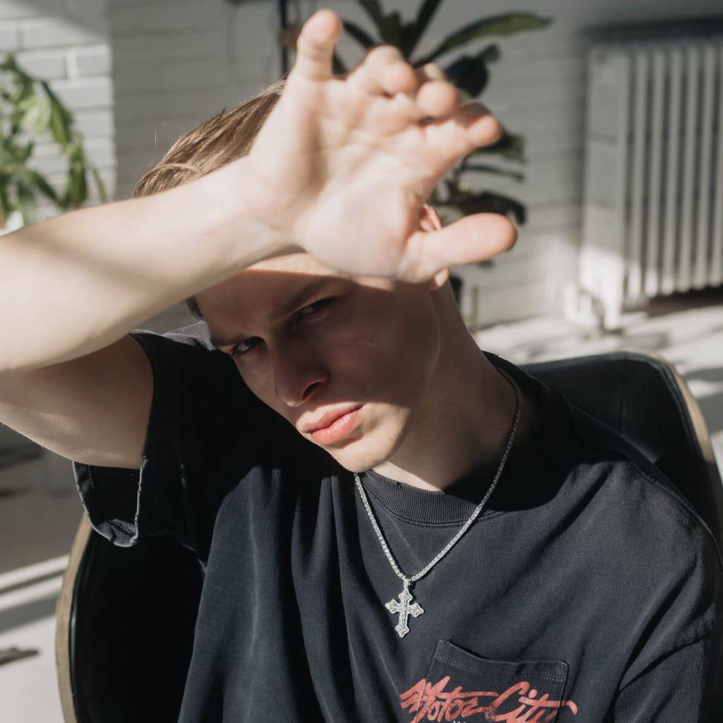 Clustered Cross White Gold Moissanite Pendant