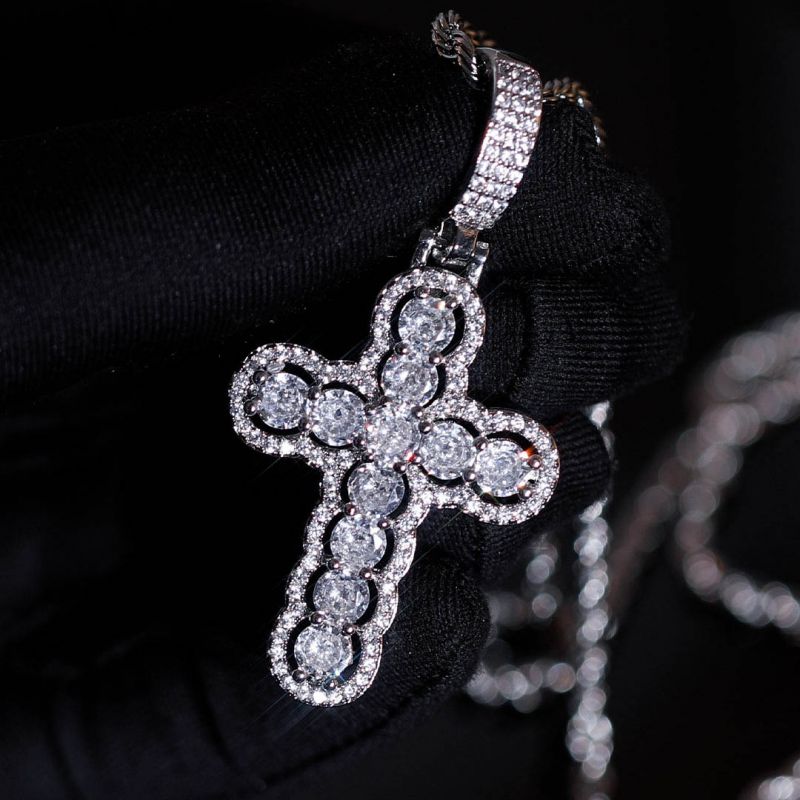 Iced Hollow Round Cut Cross Moissanite Pendant in White Gold